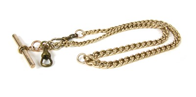Lot 1034 - A 9ct gold graduated curb link double Albert chain