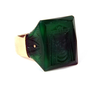 Lot 1054 - A 9ct gold dyed green agate ring