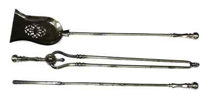 Lot 623 - A set of three George III steel fire tools