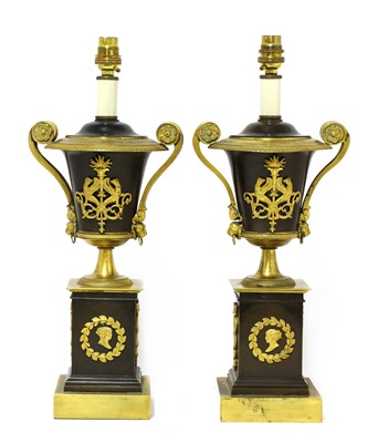 Lot 844 - A pair of French Empire-style gilt bronze lamps