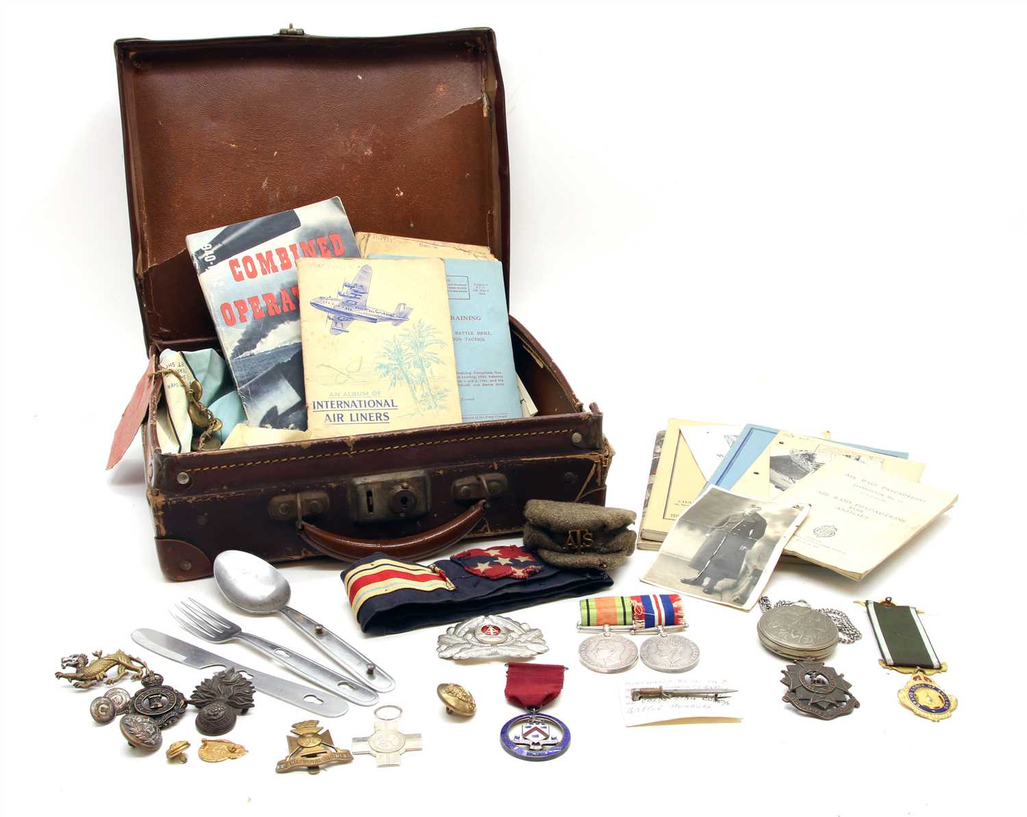 Lot 124 - A small WWII suit case