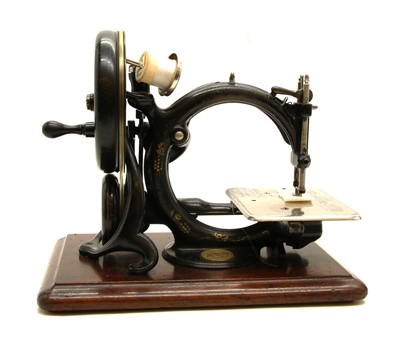 Lot 273 - A Wilcox & Gibbs sewing machine