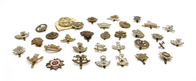 Lot 111 - A collection of approximately 34 British WWI cap badges