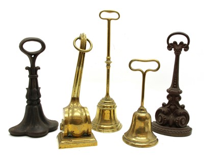 Lot 275 - Five 19th century iron and brass doorstops