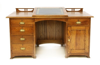 Lot 1603 - An Arts & Crafts oak pedestal desk