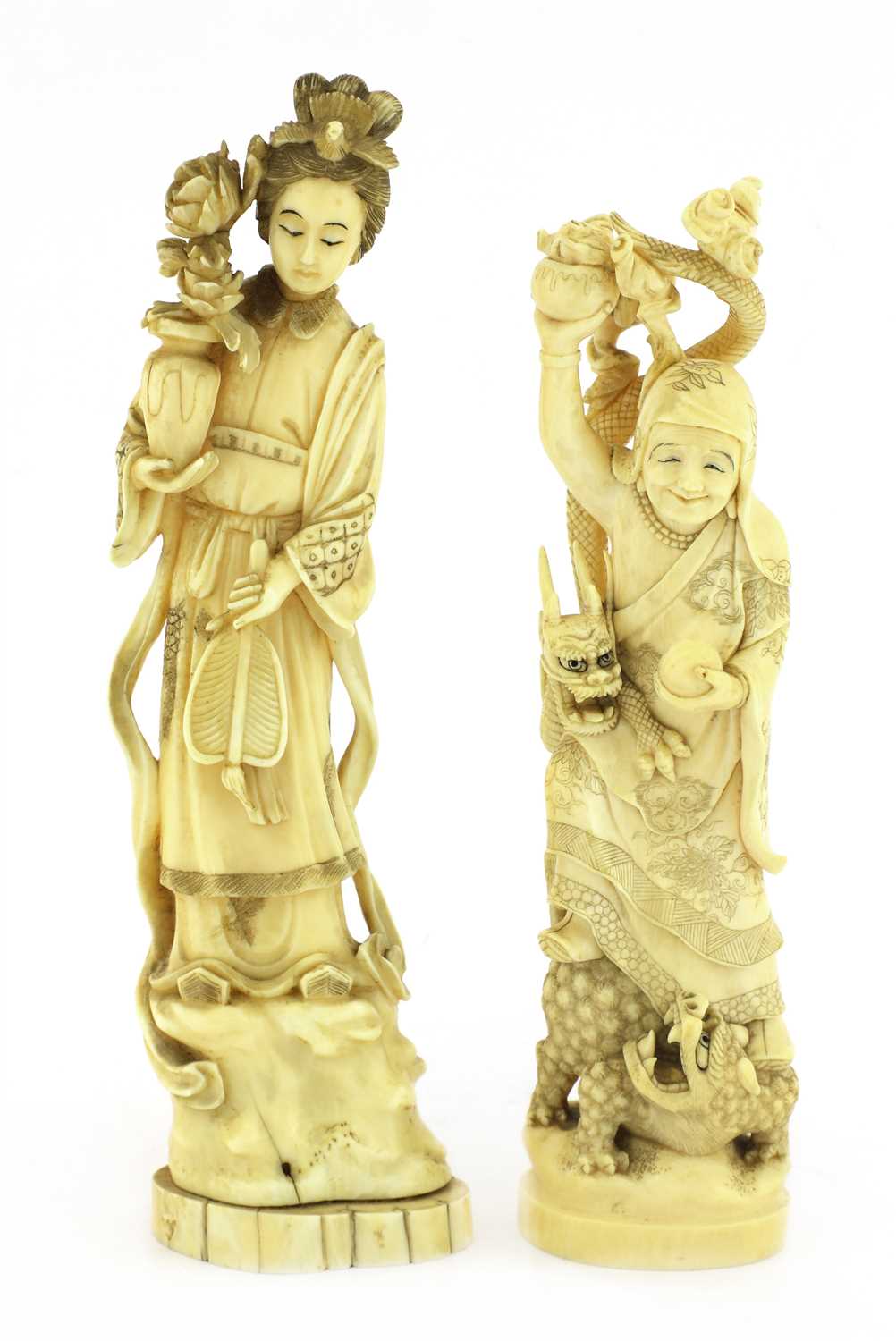 Lot 129 - Two Japanese carved ivory figures