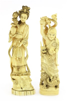 Lot 129 - Two Japanese carved ivory figures