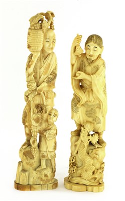 Lot 124 - Two Japanese carved ivory figure groups
