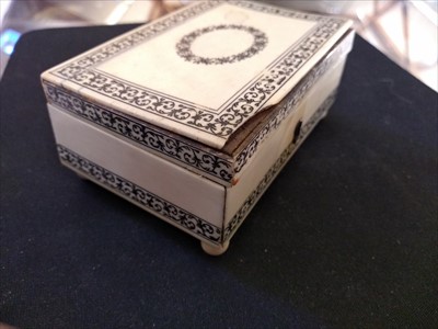 Lot 232 - A box of early 20th century oriental carved ivory items
