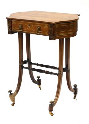 Lot 1648 - A Regency rosewood and brass inlaid work table