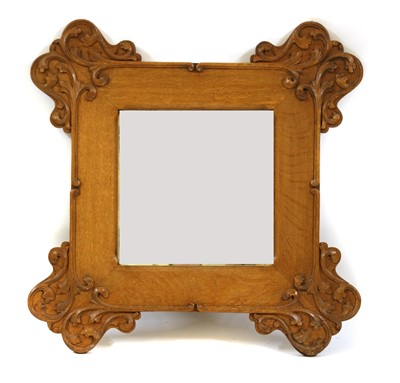 Lot 1724 - An oak Arts & Crafts style oak framed mirror