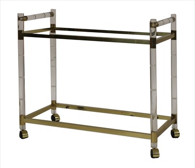Lot 711 - A lucite and brass bar trolley