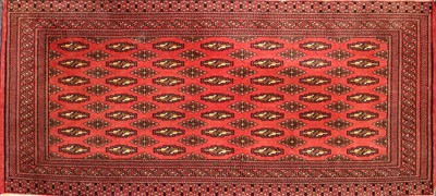 Lot 394 - A Bokhara style rug