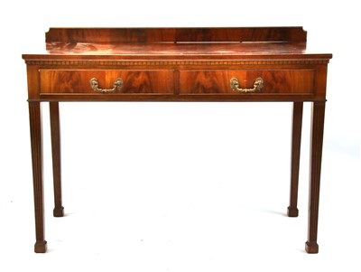 Lot 1582 - An Edwardian mahogany serving table