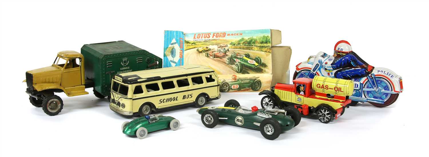 Lot 1194 - A box of four early tinplate toys