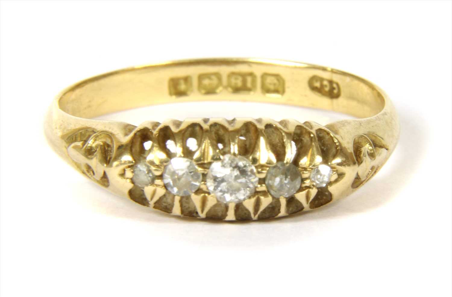 Lot 4 - An 18ct gold diamond boat shaped ring