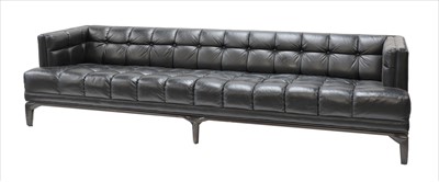 Lot 688 - A large black leather button-upholstered settee