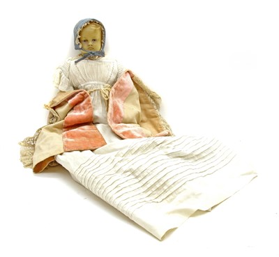 Lot 1205 - A Victorian wax headed doll
