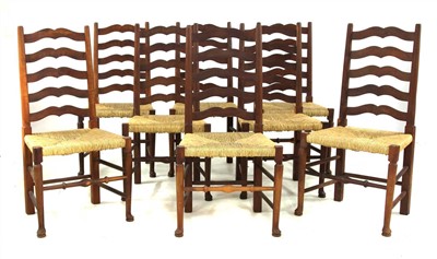 Lot 488A - A set of eight yew wood ladder back chairs