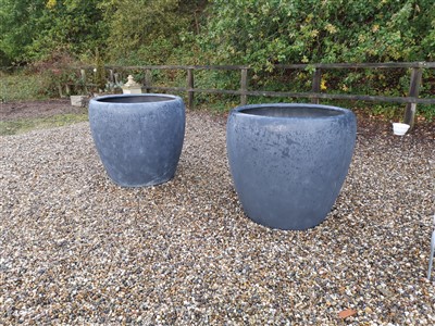Lot 130 - A pair of enormous composition garden planters