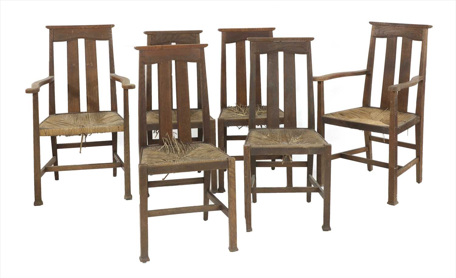 Lot 63 - A set of six Arts & Crafts oak chairs