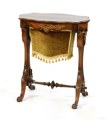 Lot 656 - A Victorian walnut inlaid work table