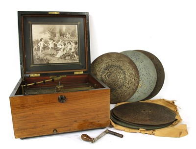 Lot 1422 - A walnut cased disc musical box
