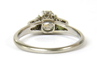 Lot 28 - A platinum three stone diamond ring