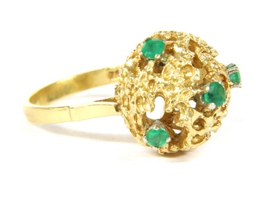 Lot 1018 - An Italian 18ct gold emerald ring