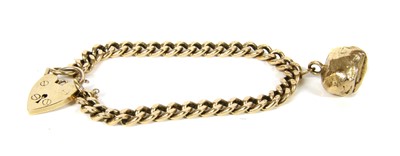 Lot 1037 - A 9ct gold curb bracelet