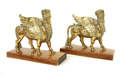 Lot 1464 - A pair of cast Assyrian Lamassu Bulls