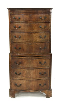 Lot 1681A - A Georgian style serpentine mahogany small chest on chest