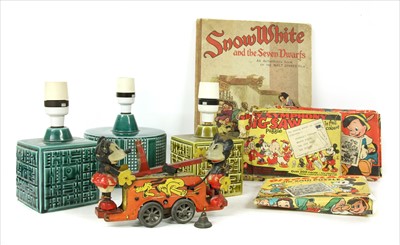 Lot 476 - A Mickey and Minnie Mouse clockwork tinplate hand cart, c.1935