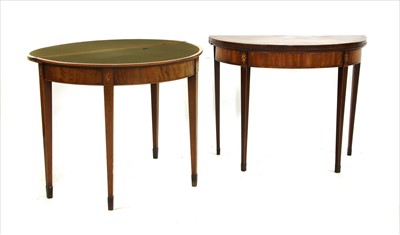 Lot 609 - A near pair of George III mahogany card tables