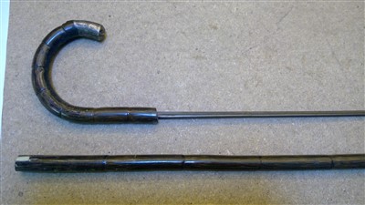 Lot 1434 - A collection of four silver mounted imitation bamboo sword sticks