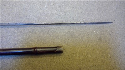 Lot 1434 - A collection of four silver mounted imitation bamboo sword sticks