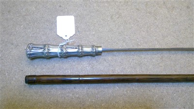 Lot 1434 - A collection of four silver mounted imitation bamboo sword sticks