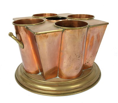 Lot 146 - A copper and brass twin-handled sectional wine cooler