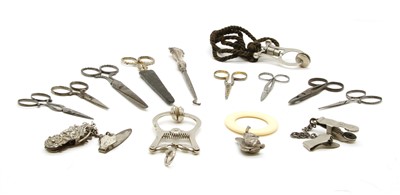 Lot 1096 - Various items, comprising: 4 dress clips and 7 pairs of scissors