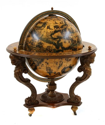 Lot 1647 - A novelty combination terrestrial globe and cocktail cabinet