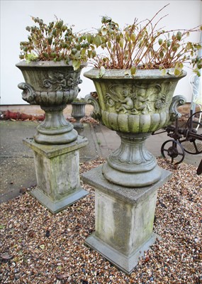 Lot 791 - A pair of composite stone Campana urns