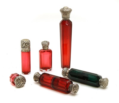 Lot 1099 - A collection of Victorian cut glass scent bottles