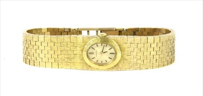 Lot 137 - A ladies' 18ct gold Longines mechanical bracelet watch