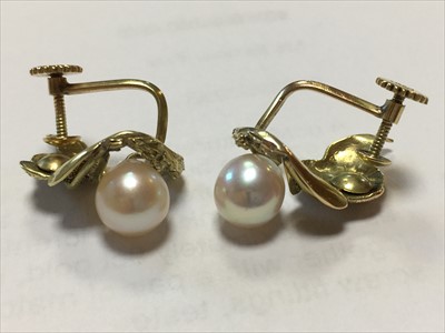 Lot 54 - A gold cultured pearl ring and earrings suite, c.1970