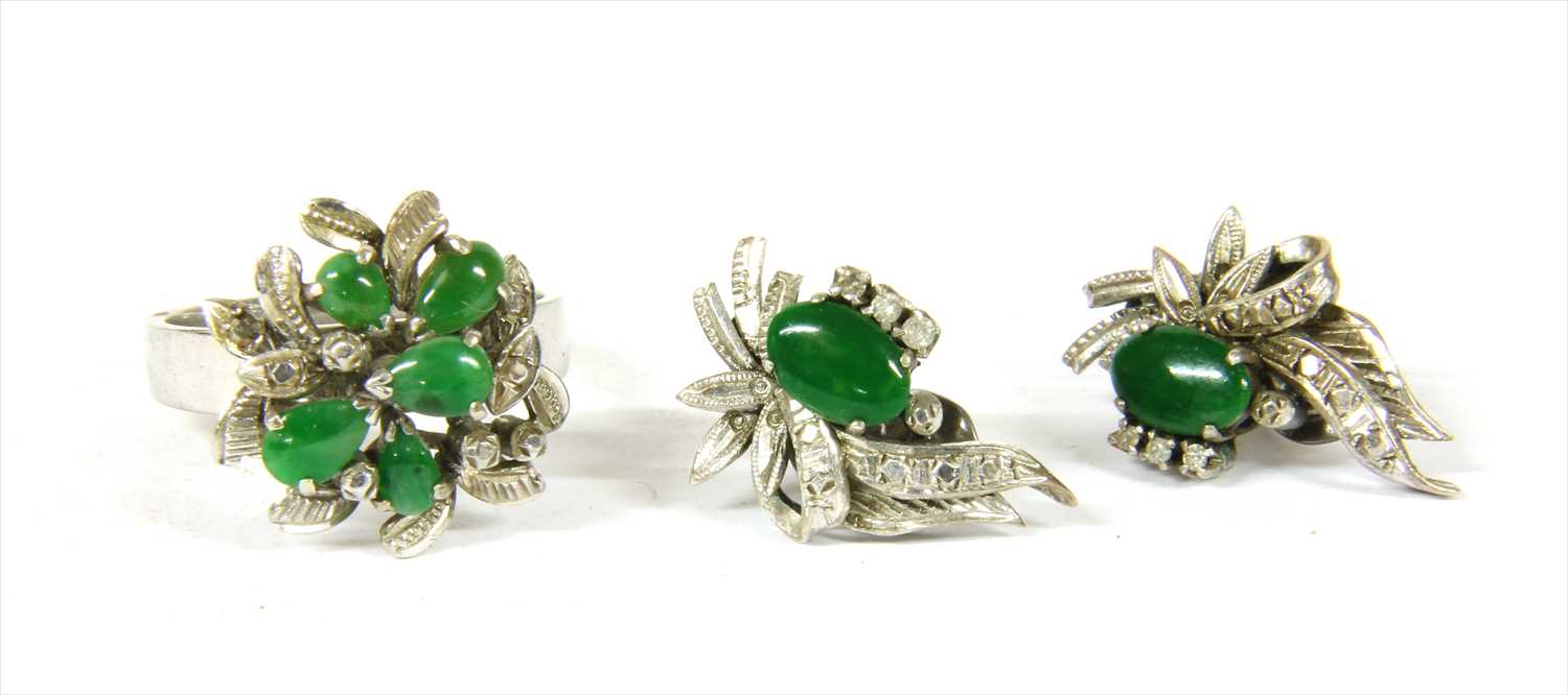Lot 53 - A white gold jade spray ring and earrings suite, c.1970