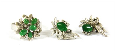 Lot 53 - A white gold jade spray ring and earrings suite, c.1970