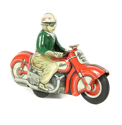 Lot 1172 - A Schuco Curvo 1000 tin plate motorcycle and rider