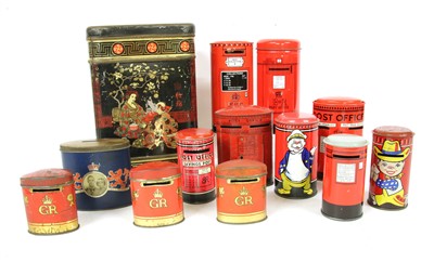 Lot 1308 - A collection of biscuit tins and money banks