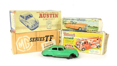 Lot 1180 - Four vintage toy cars