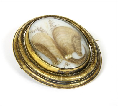 Lot 15 - A Victorian gold mourning brooch